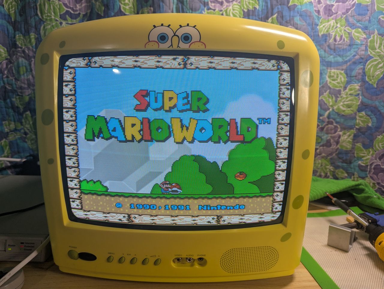 SB315 - RGB image of Super Mario World title screen.