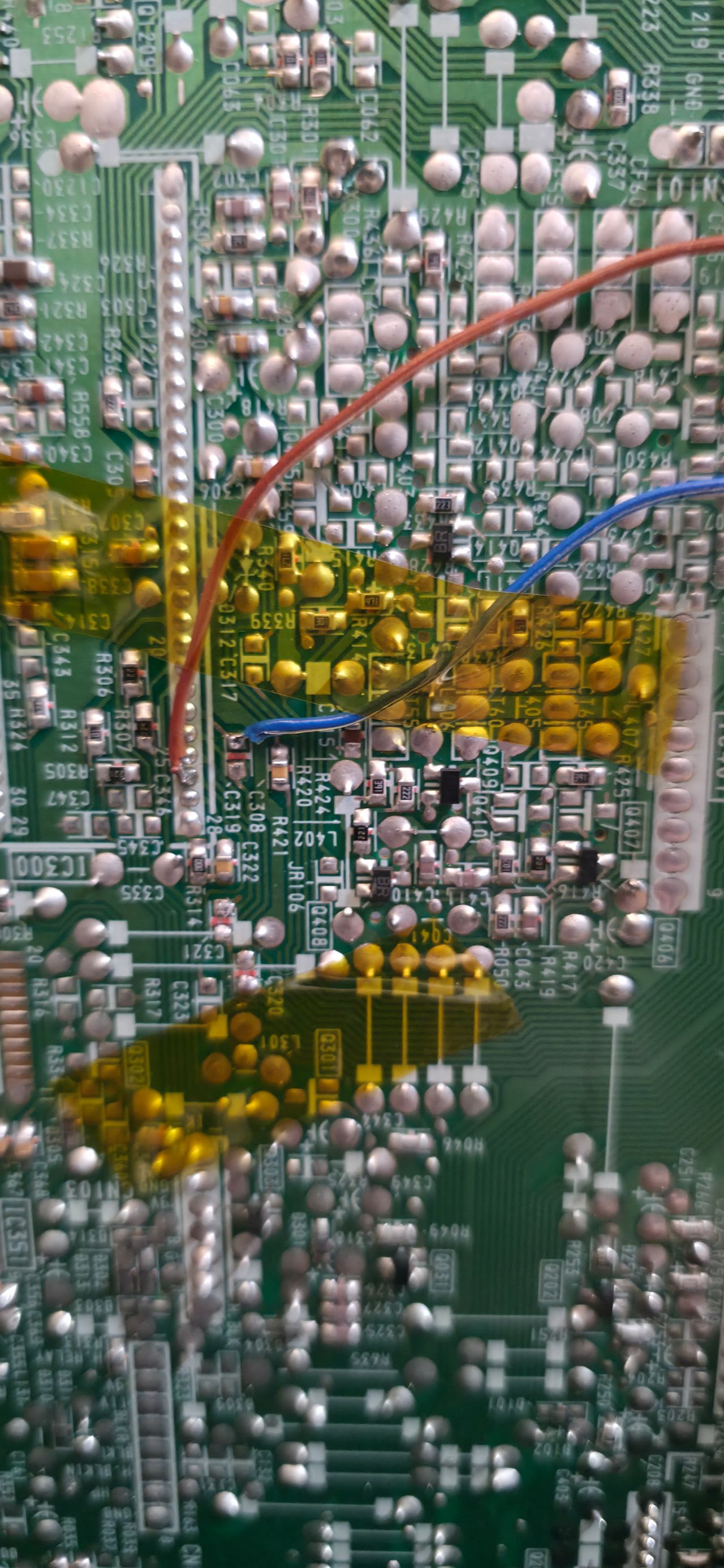 KV-G14P1 - Closeup of blue wire soldered to the C319 pad that is closer to the jungle.