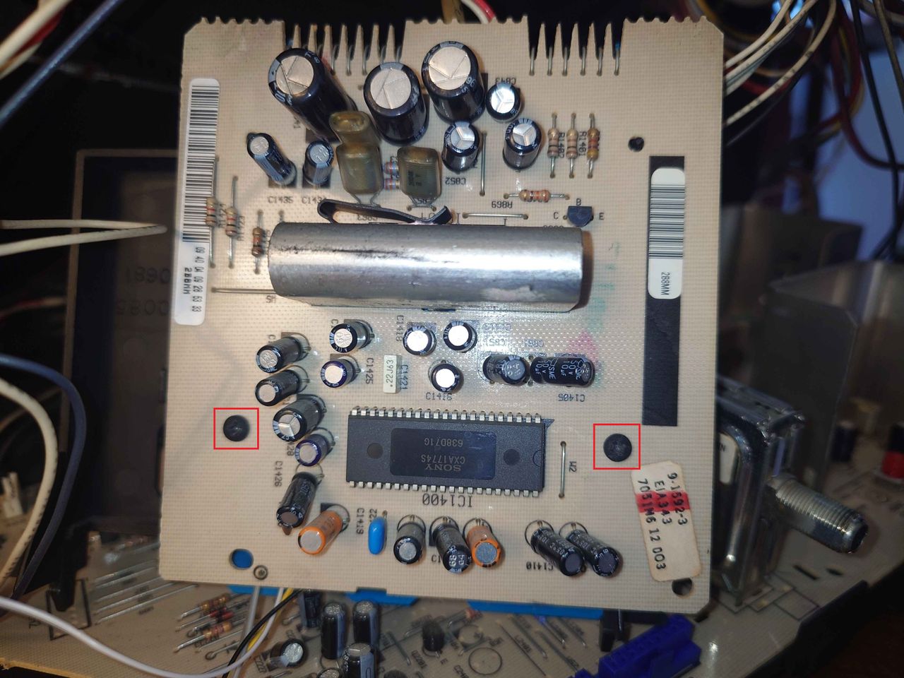 SY2568S - Lift up the rear input module off the board and take out these two screws so that you may then bend the module o...